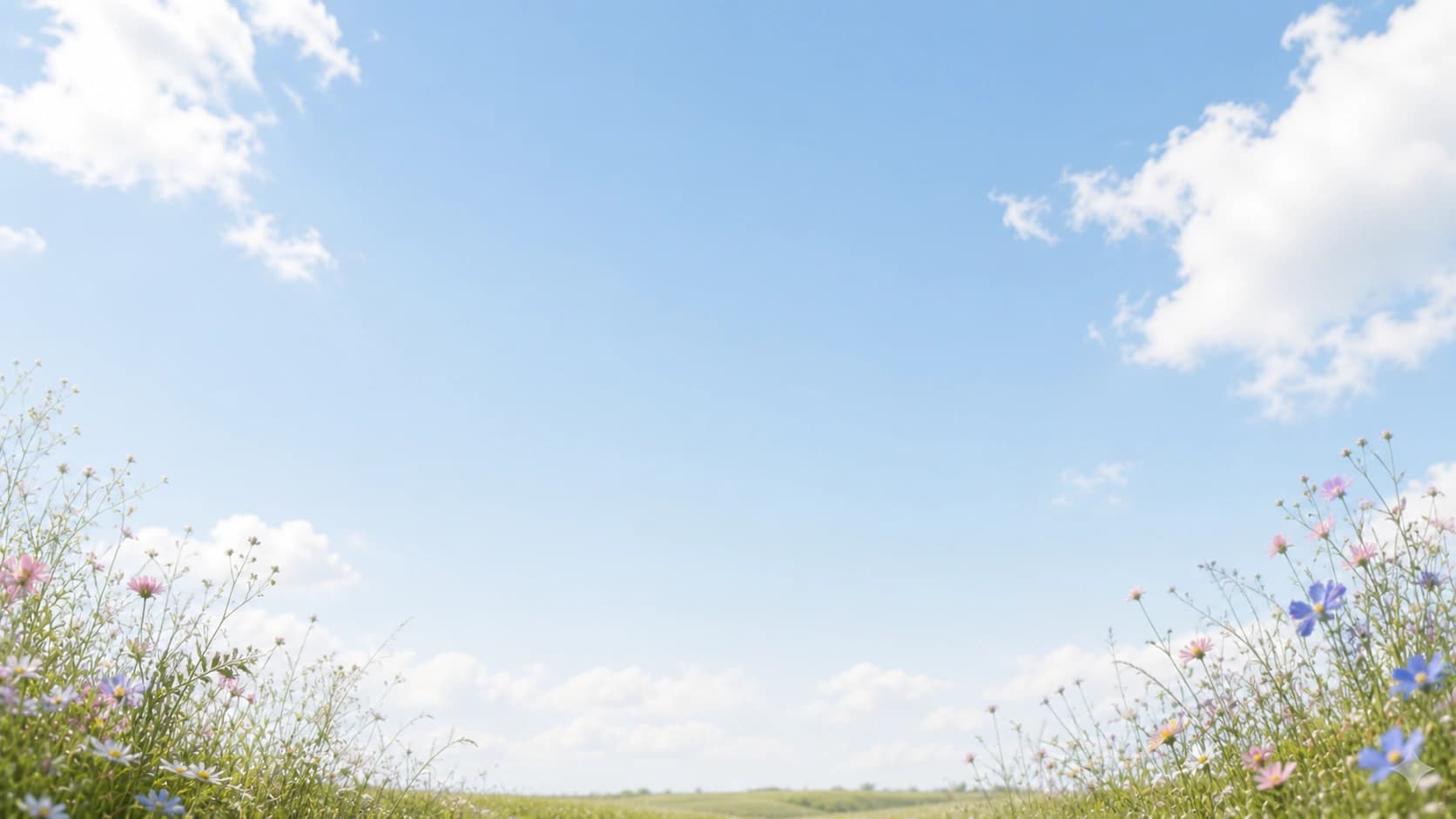 Rolling green hills and spring flowers beneath an open blue sky.